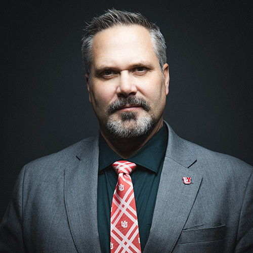 Headshot of Jeff Herring with a dark background